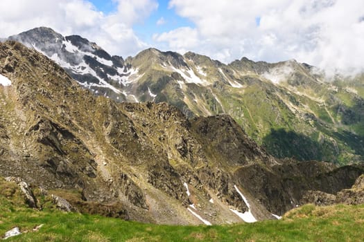 rows of mountains and a sky with clouds, Fagaras mountains, Romania