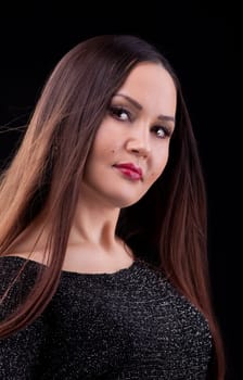 woman with long hair in dark cloth look at you