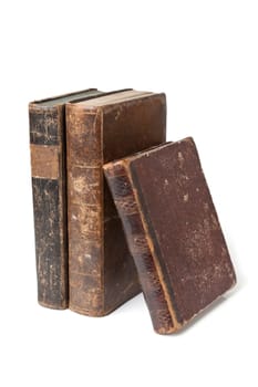 Old books with wear and tear isolated on white background