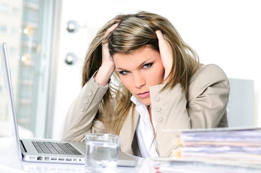 frustrated woman working on computer