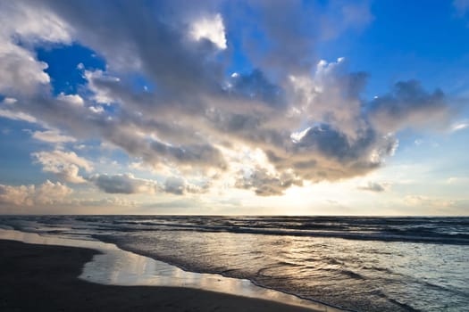 blue sky filled with clouds over the sea