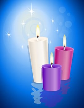 Three candles over a blue background