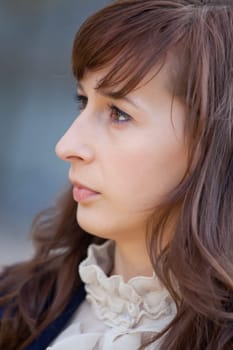 profile portrait of fashion woman posing outdoor