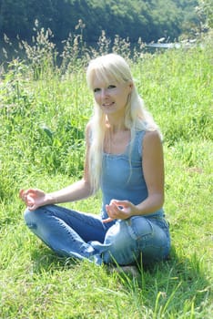 young woman yoga meditation outdoor