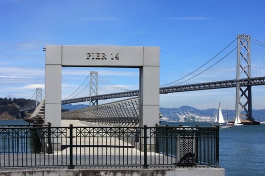 Pier in front of bridge