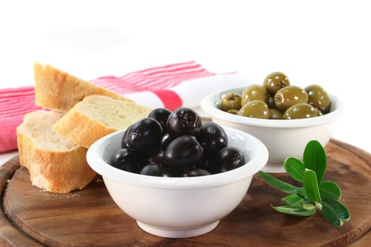 black and green olives and an olive branch