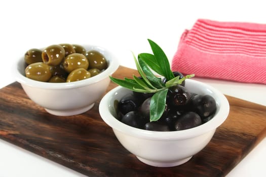 black and green olives and an olive branch
