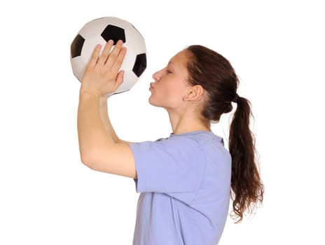 Young woman kissing soccer