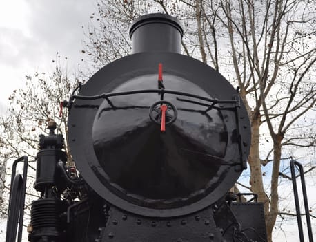 Detail of ancient steam train locomotive vehicle