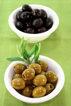 black and green olives and an olive branch