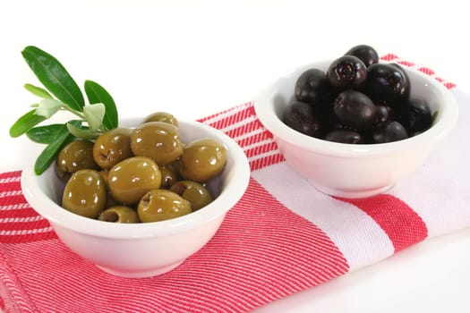 black and green olives and an olive branch