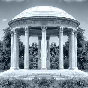 Classical circular temple in a garden - High dynamic range HDR