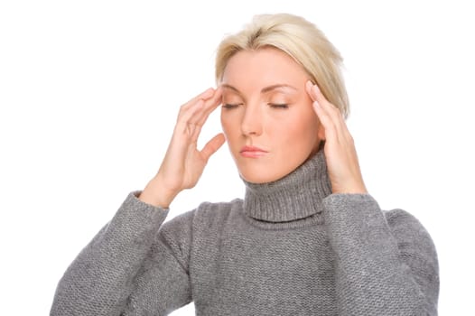 Studio shot of a young woman with a headache