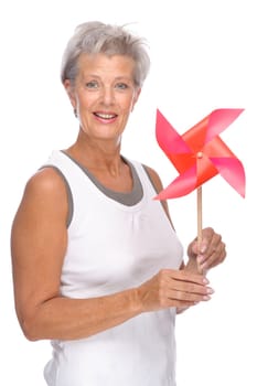 Studio shot of an active and happy senior woman