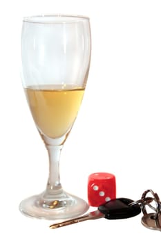 dice and champagne flute with car keys on white background depicting gambling with drunk driving and addictions can kill