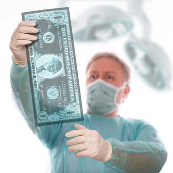 Specialist reviewing dollar x-ray before taking last decision