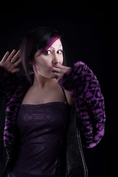 Young girl in purple fur coat - gothic style make up