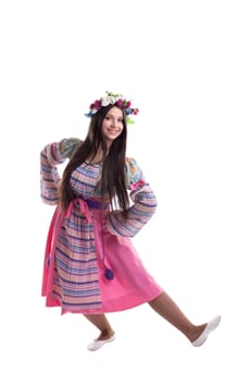 Beauty young girl with garland in traditional russian costume