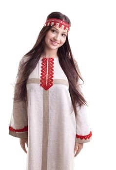 Young girl in dance pose - flax traditional russian costume