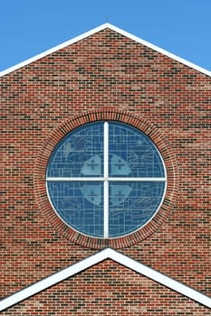 Stained glass windows with brick background