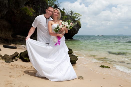 Wedding on the beach,in a wedding dress by the sea in Thailand