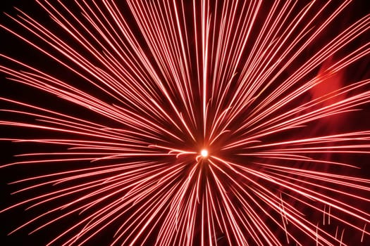 an image of exploding fireworks at night.