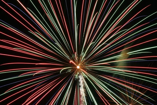 an image of exploding fireworks at night.