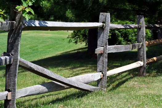 an image of a Broken Wooden Rail Fence