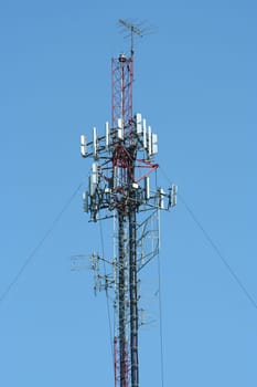 Cell Phone Tower against a blue sky