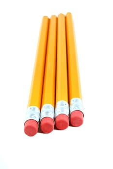Four Yellow pencils isolated on white background