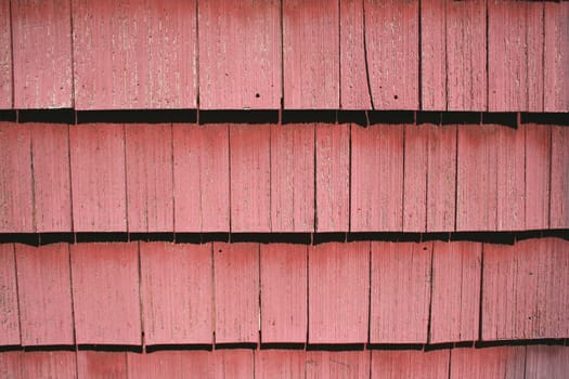 Weathered Red shingle siding on the side of a barn