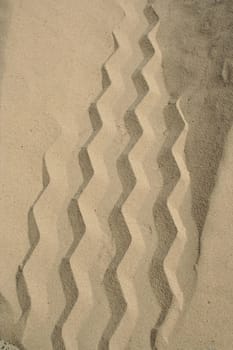 Rough sand meeting smooth sand