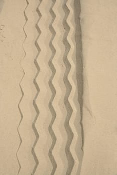 Rough sand meeting smooth sand