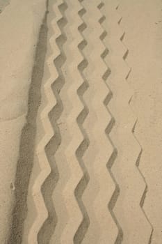 Rough sand meeting smooth sand