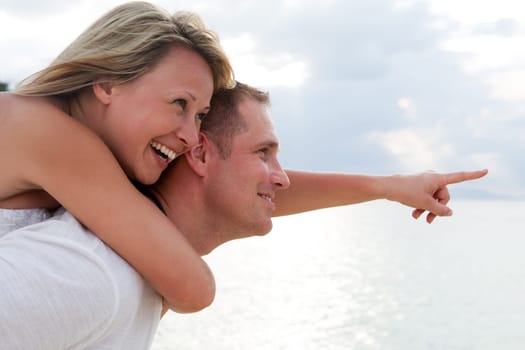 Happy people,couple in love on vacation at the beach