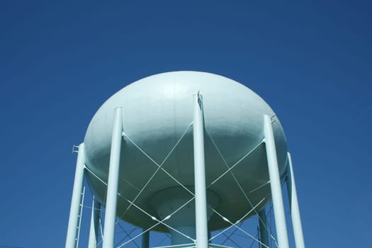 Blue Water Tower against a blue sky