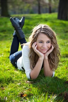 Young woman relaxing on a sunny day in park