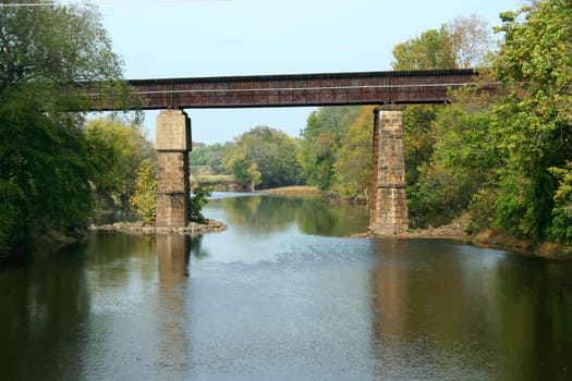 A Train Tressel over a river with support columns