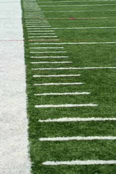 White Football Yard Markers on astro turf
