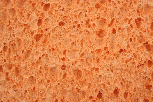 Orange sponge textured background