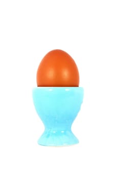 Chicken egg on the pedestal isolated on white