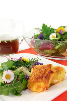 Wild herb salad with dandelion,wild garlic and daisies
