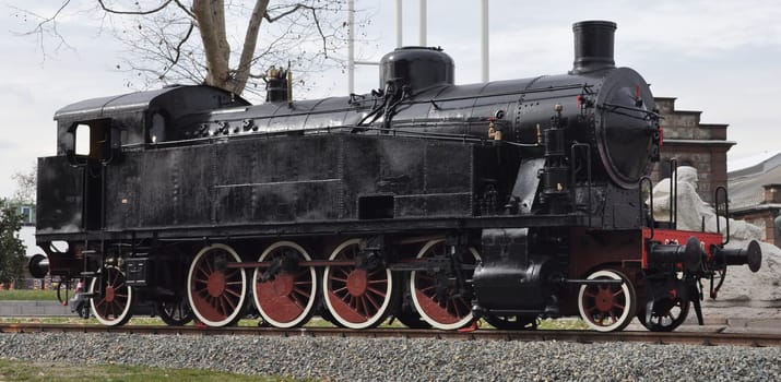 Detail of ancient steam train locomotive vehicle