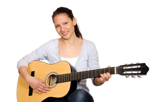 Young woman playing guitar