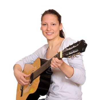 Young woman playing guitar