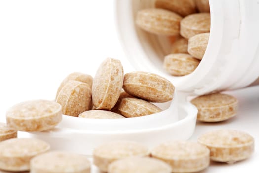 heap of pills isolated on the white background
