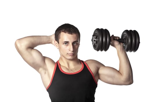 handsome guy in black-and-red undershirt holding dumbbell (low saturation toning)