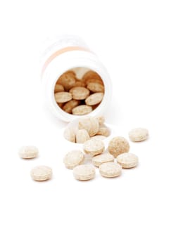 heap of pills isolated on the white background