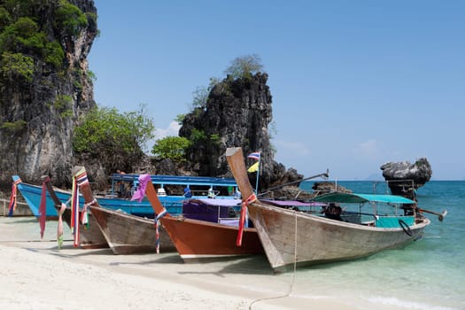 Thailand,traditional longtail boat takes tourists to the islands in Krabi