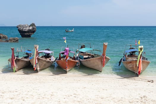 Thailand,traditional longtail boat takes tourists to the islands in Krabi